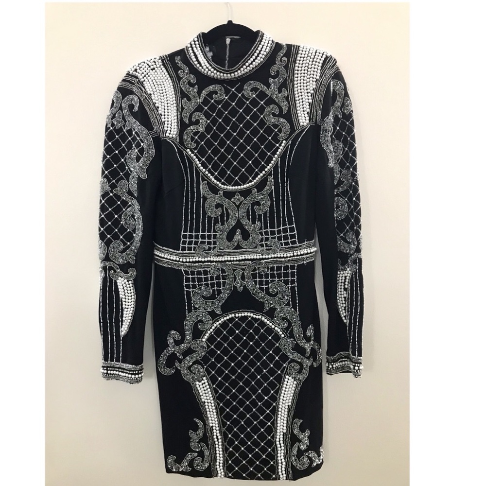 Bebe long sleeved knee length dress size S